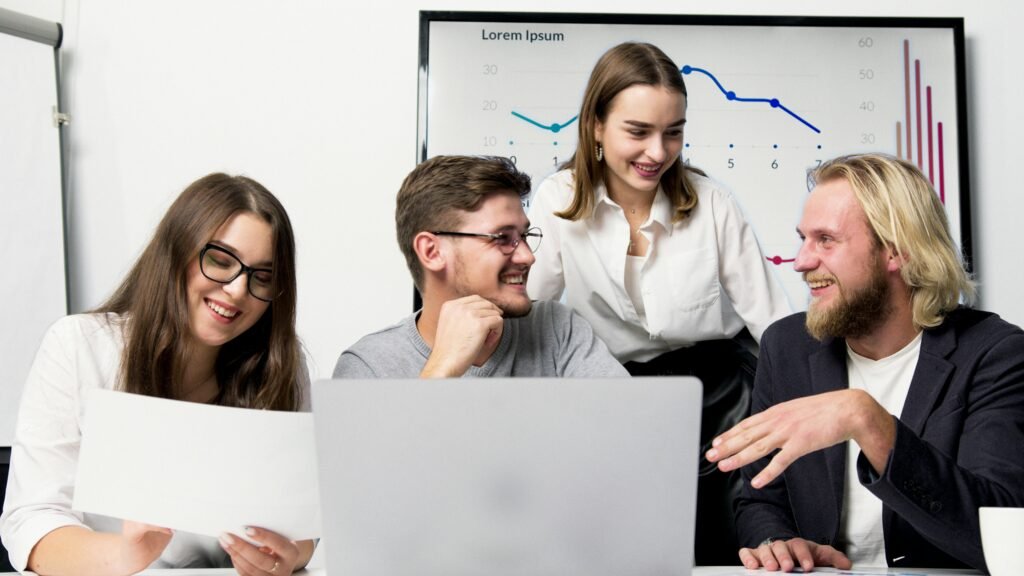 A Team Smiling While Working